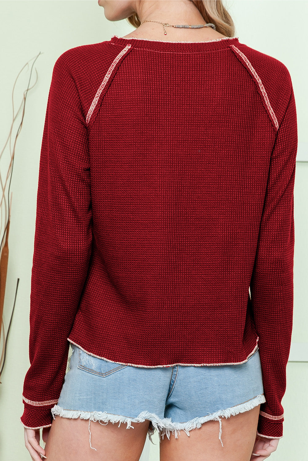 Red Exposed Seam Textured Pullover Long Sleeve Top